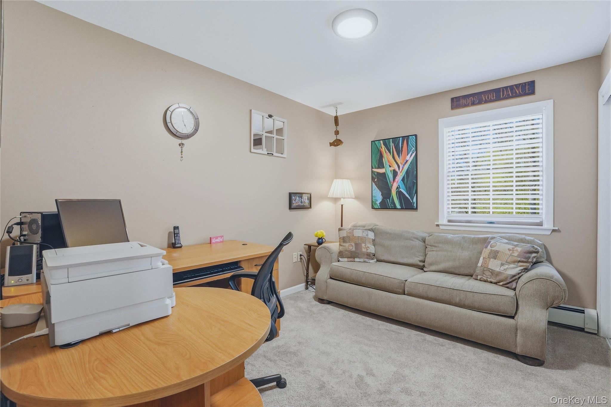36 River Glen Road Wallkill, NY 12589 - Photo 37 of 47 a living room with furniture and a window