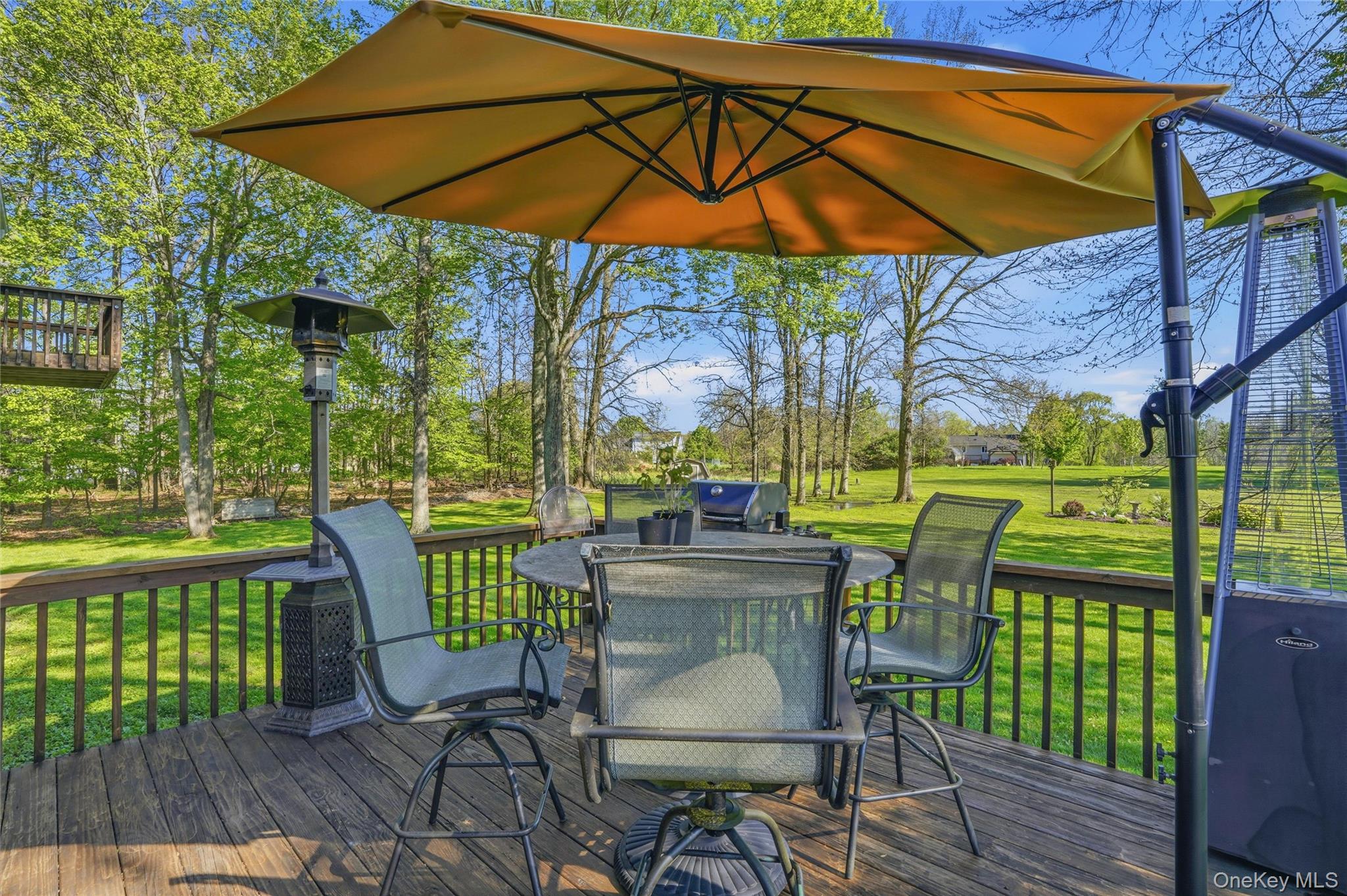 36 River Glen Road Wallkill, NY 12589 - Photo 42 of 47 a view of a chair and table in the patio