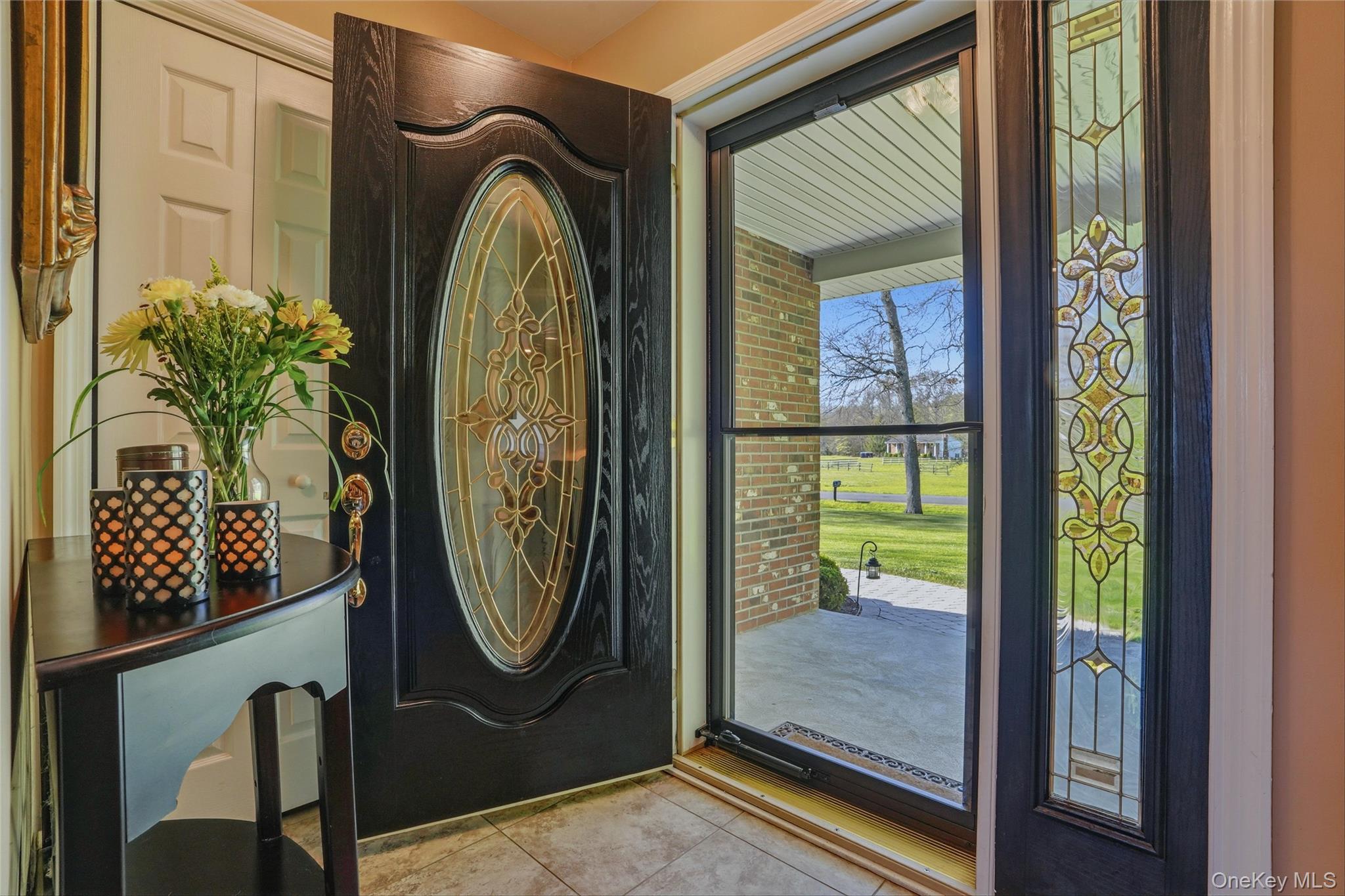 36 River Glen Road Wallkill, NY 12589 - Photo 5 of 47 a view of an entryway with a garden