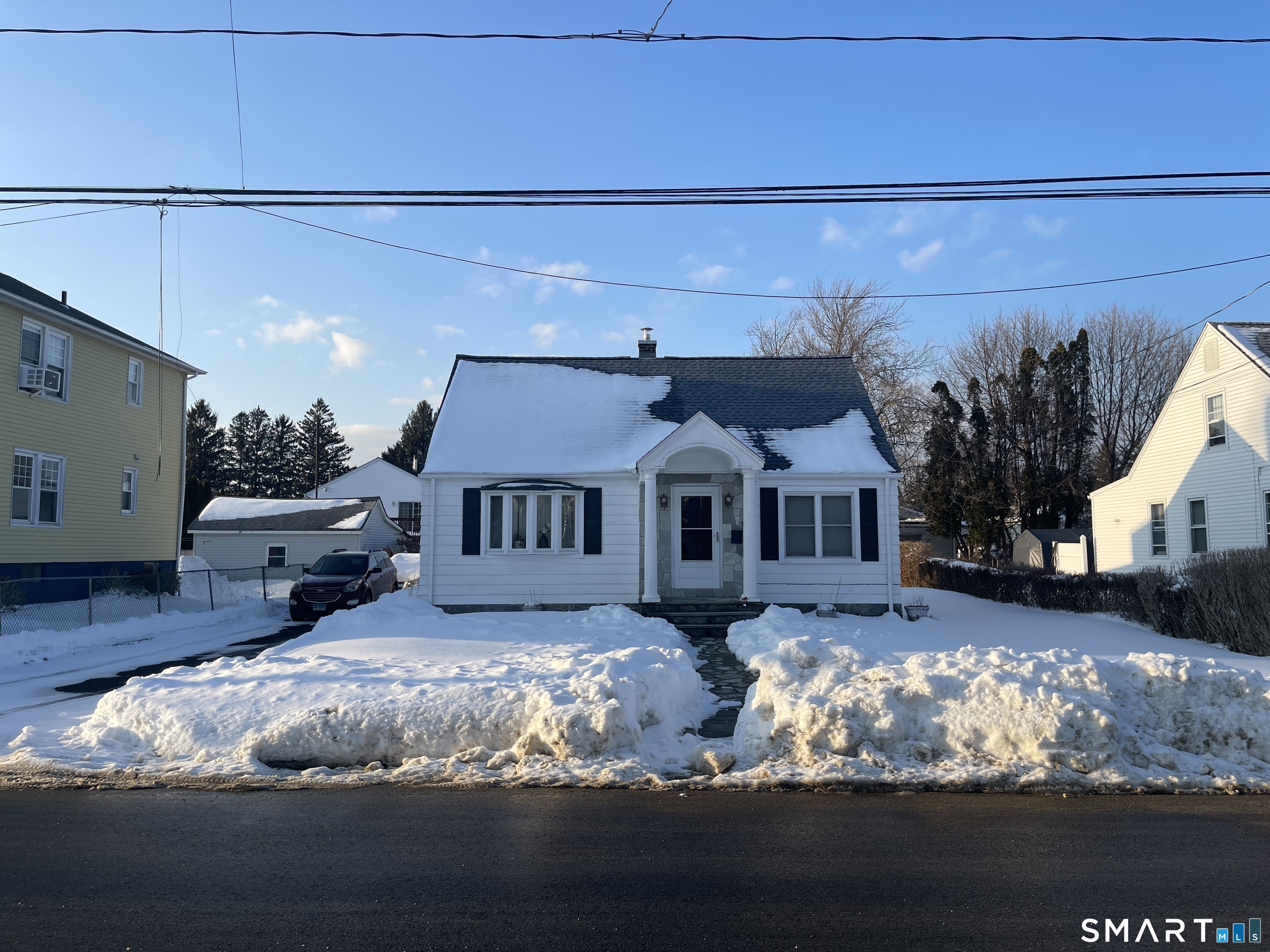 52 Bennett Avenue Waterbury, CT 06708 - Photo 2 of 36 a front view of a house with a big yard