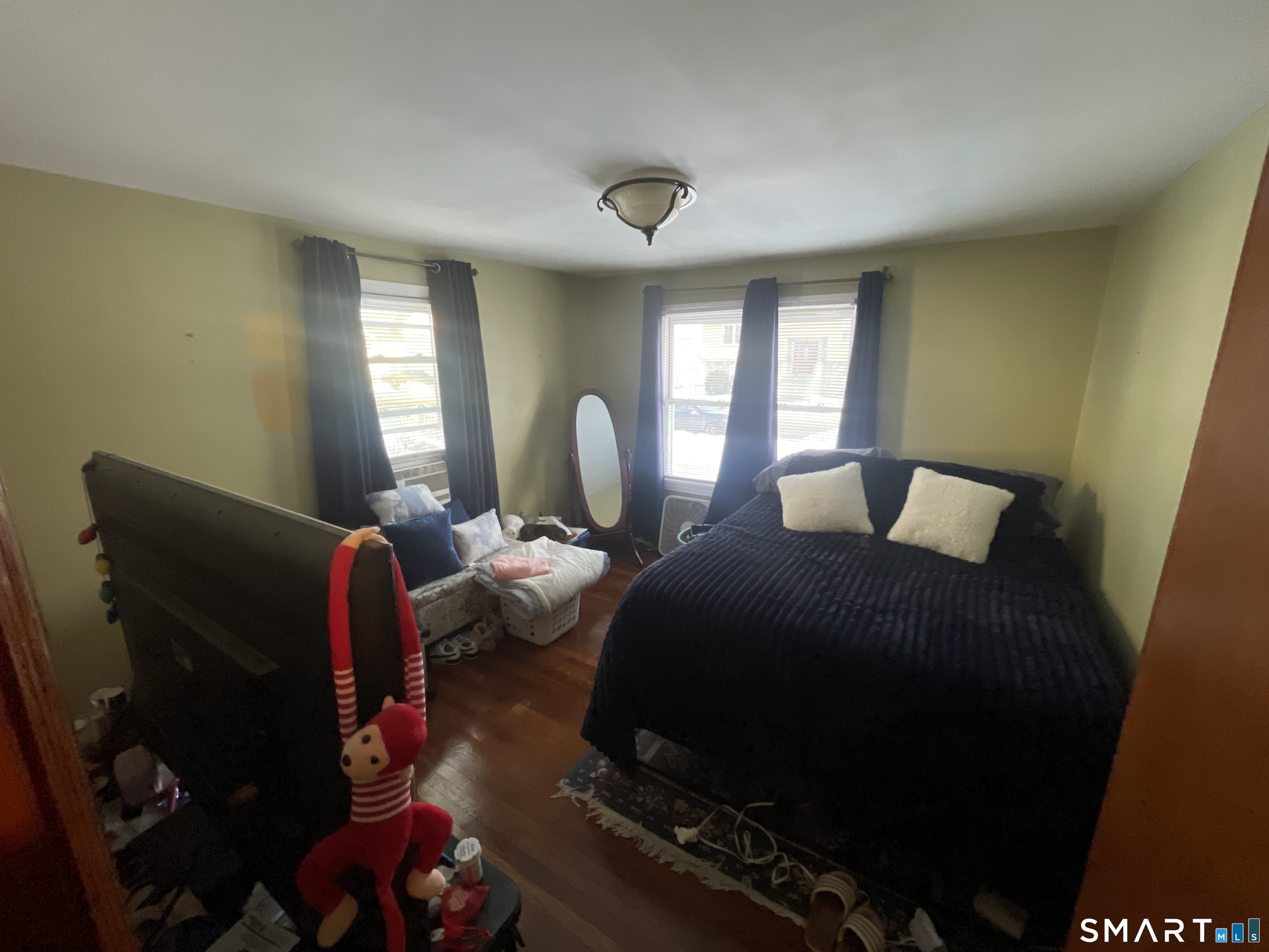 52 Bennett Avenue Waterbury, CT 06708 - Photo 22 of 36 a bedroom with a bed and window