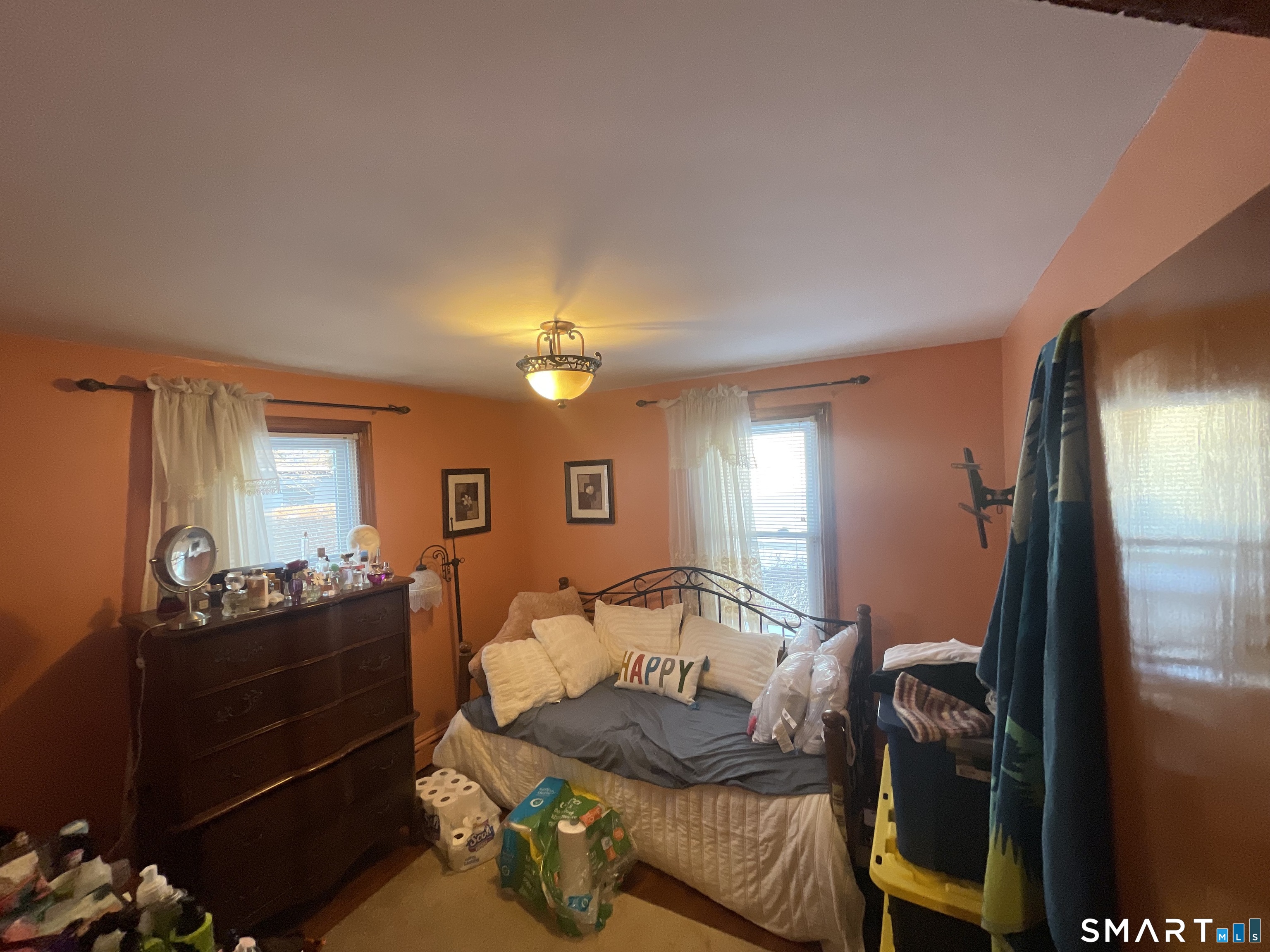 52 Bennett Avenue Waterbury, CT 06708 - Photo 25 of 36 a bedroom with a bed and dresser