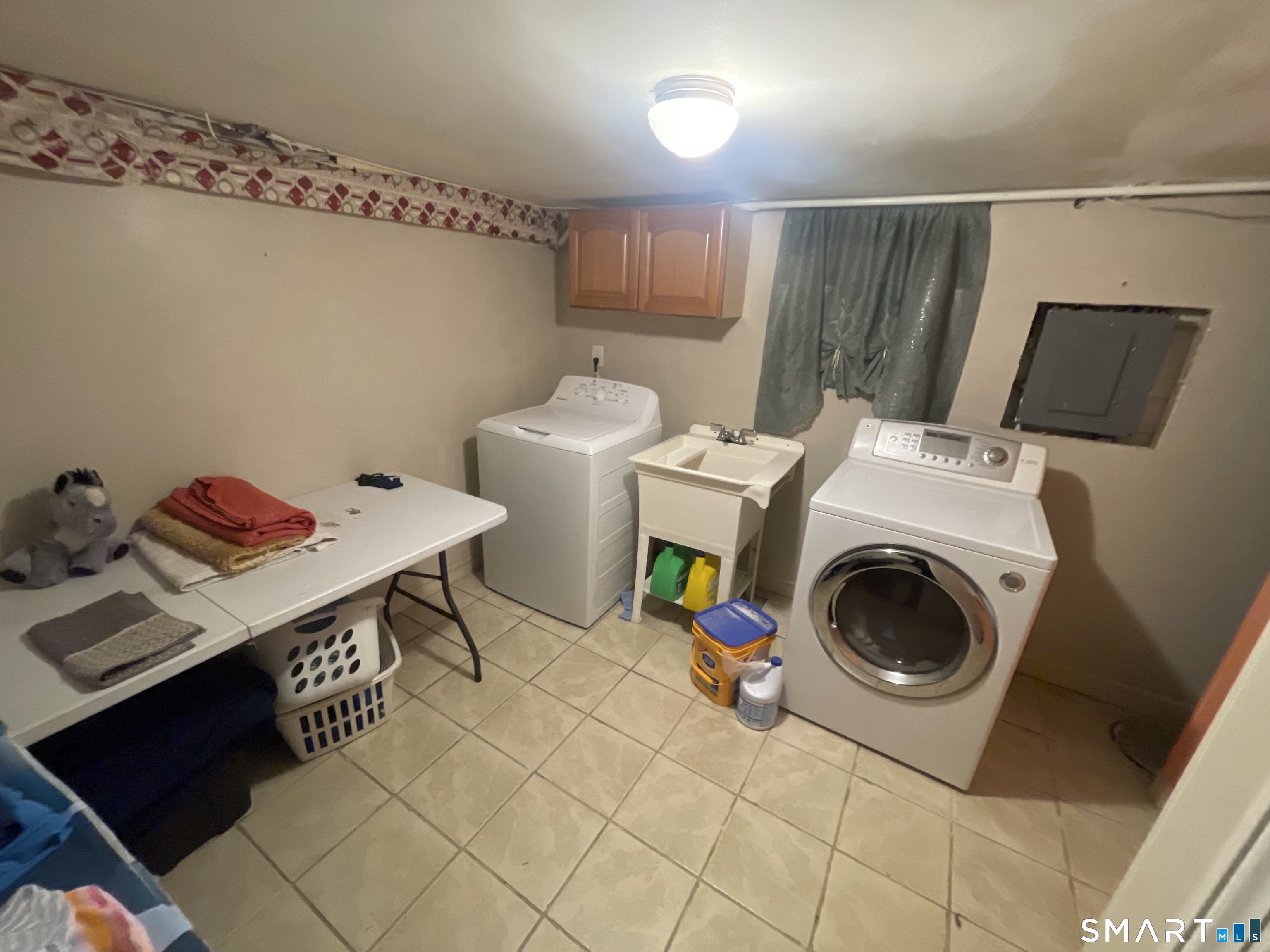 52 Bennett Avenue Waterbury, CT 06708 - Photo 26 of 36 a utility room with dryer and washer