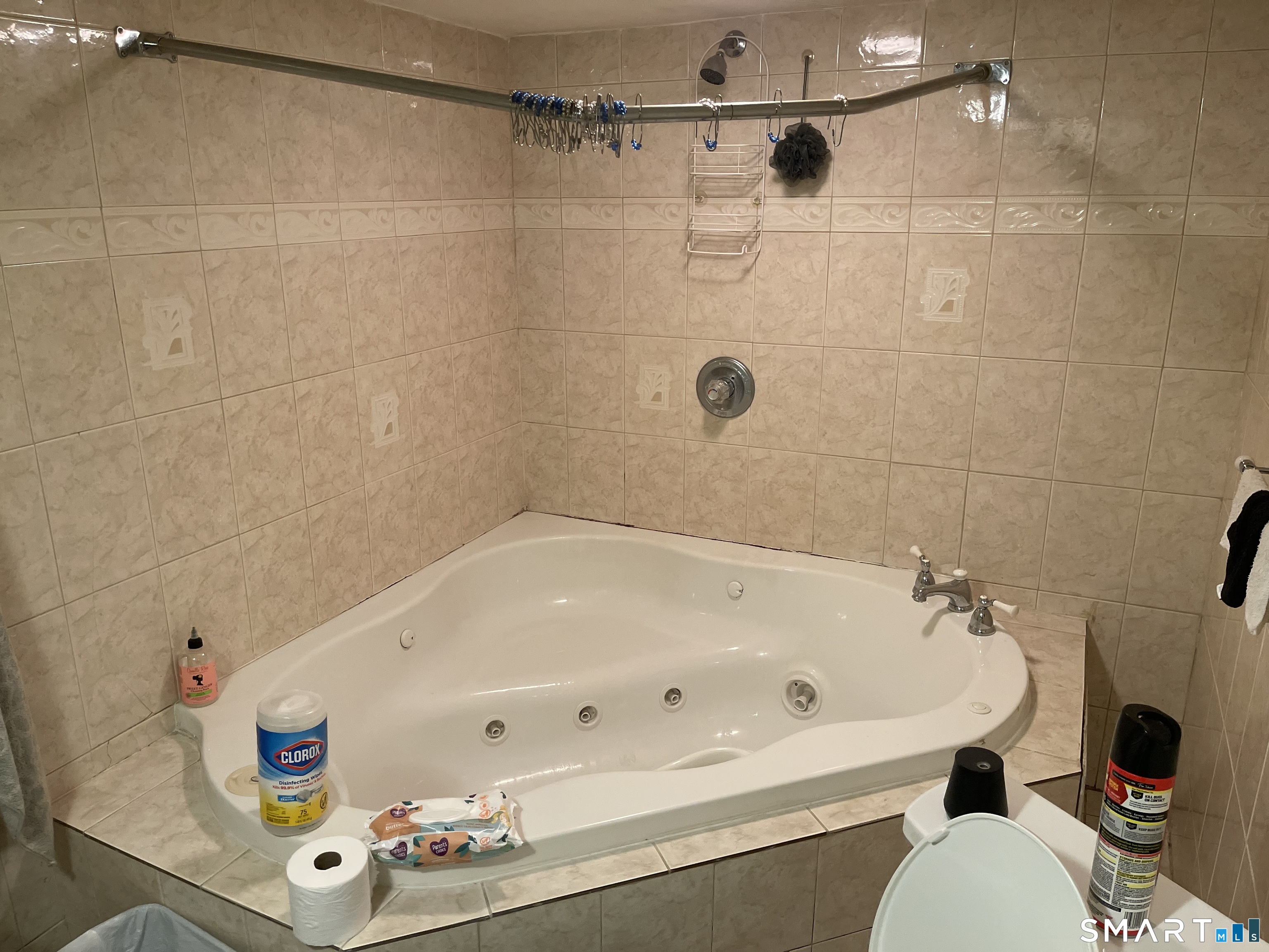 52 Bennett Avenue Waterbury, CT 06708 - Photo 34 of 36 a bathroom with a white bath tub and a shower