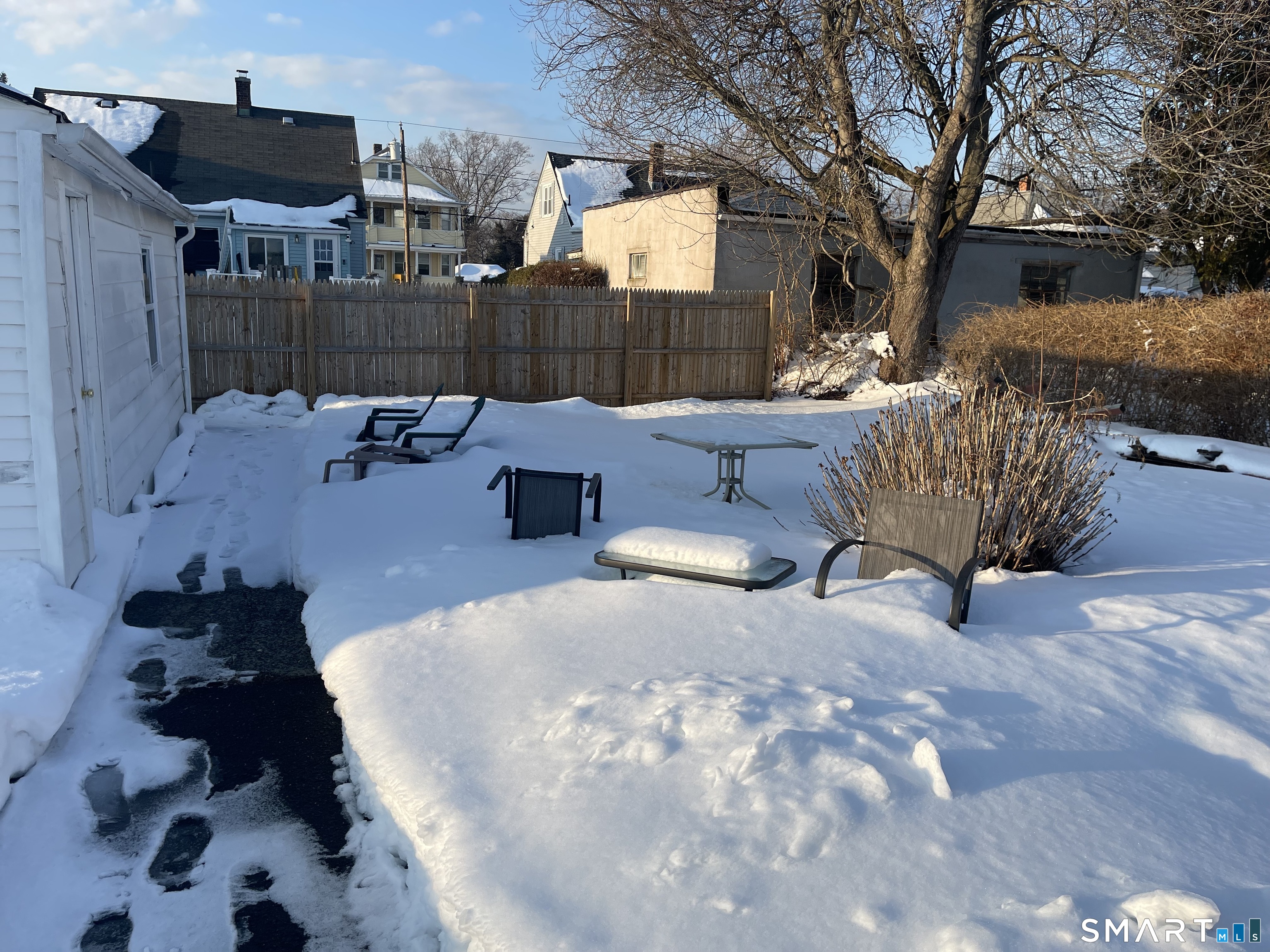 52 Bennett Avenue Waterbury, CT 06708 - Photo 4 of 36 a swimming pool with outdoor seating