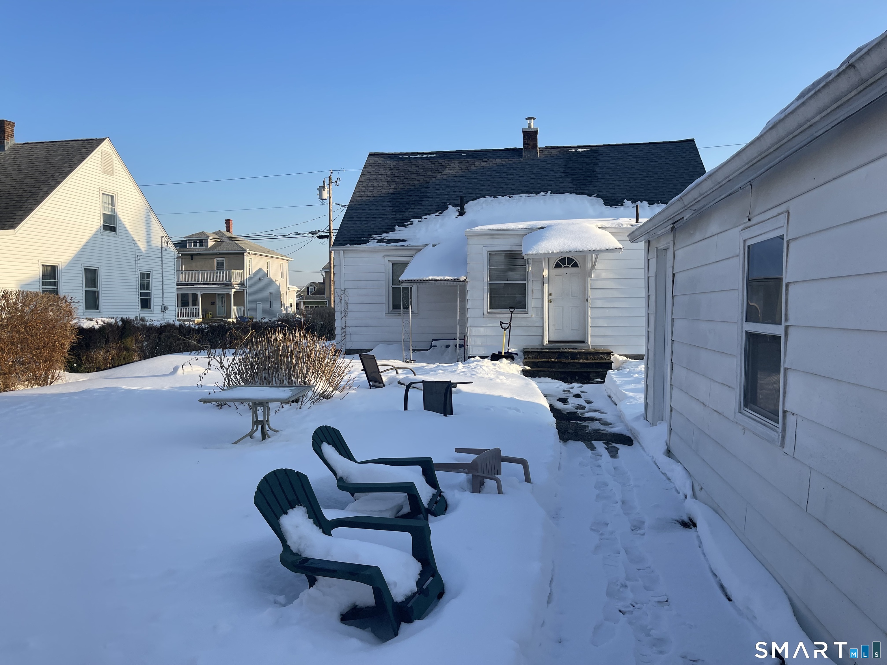 52 Bennett Avenue Waterbury, CT 06708 - Photo 5 of 36 a building outdoor space with patio furniture