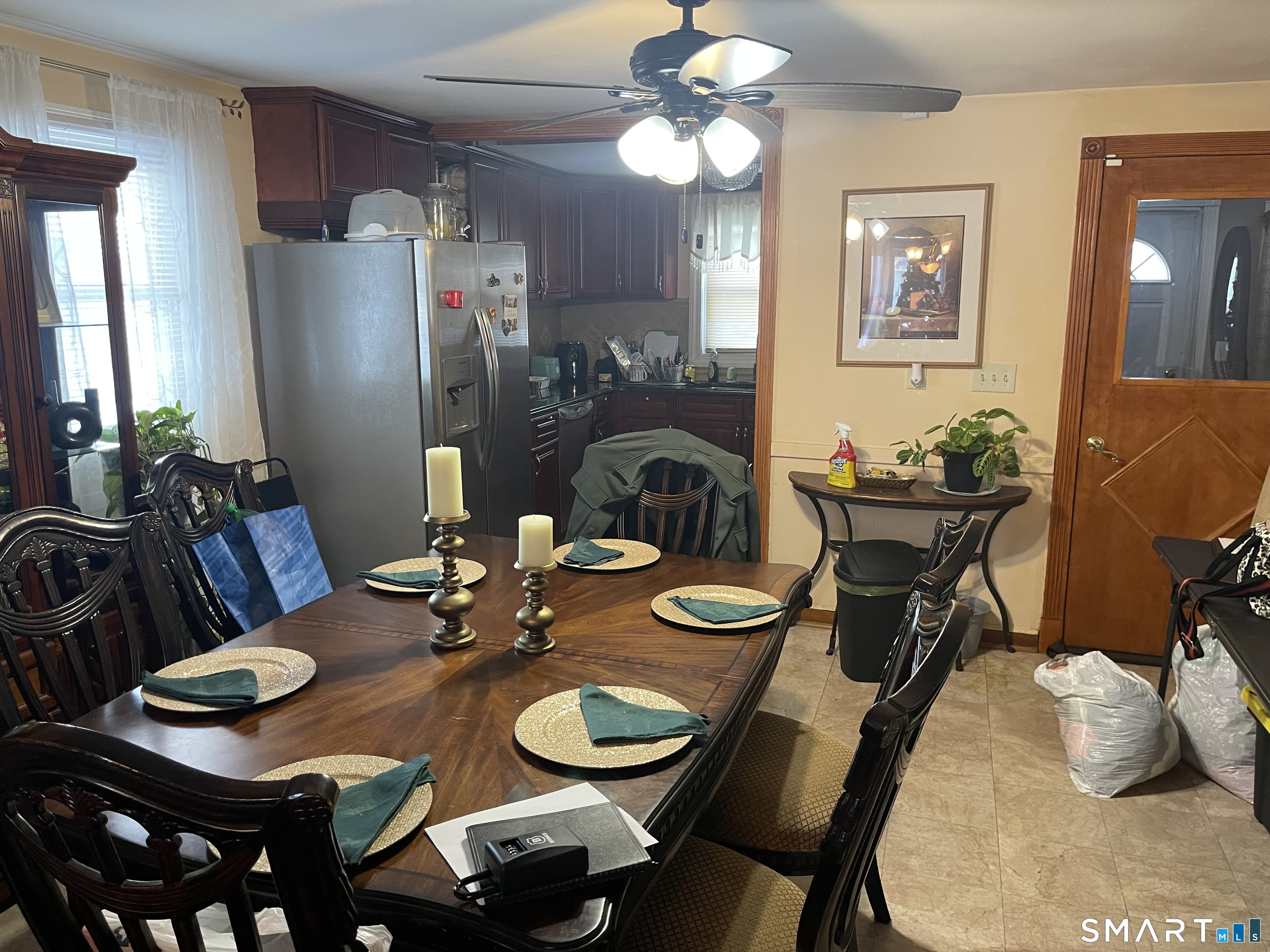 52 Bennett Avenue Waterbury, CT 06708 - Photo 10 of 36 a view of a dining room with furniture and chandelier