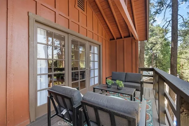 a outdoor living room with furniture and outdoor space