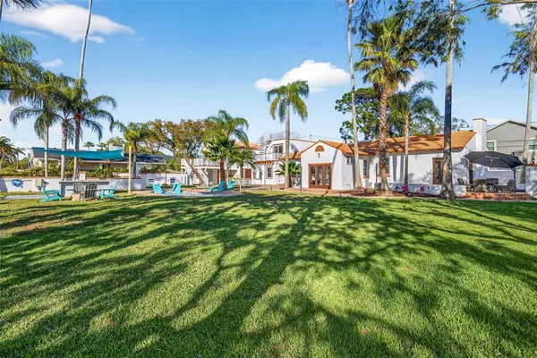 a view of a park with palm trees