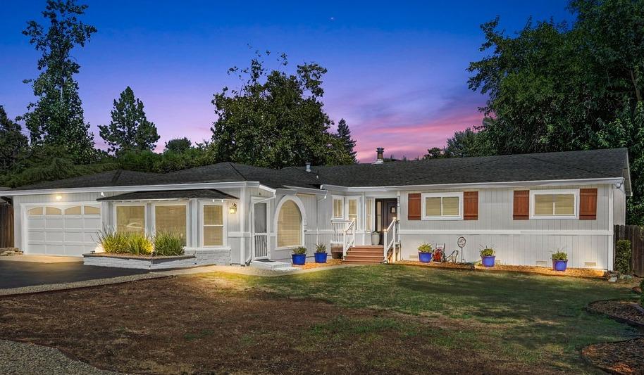 3801 Millbrae Road Cameron Park, CA 95682 - Photo 1 of 1 a front view of a house with a yard