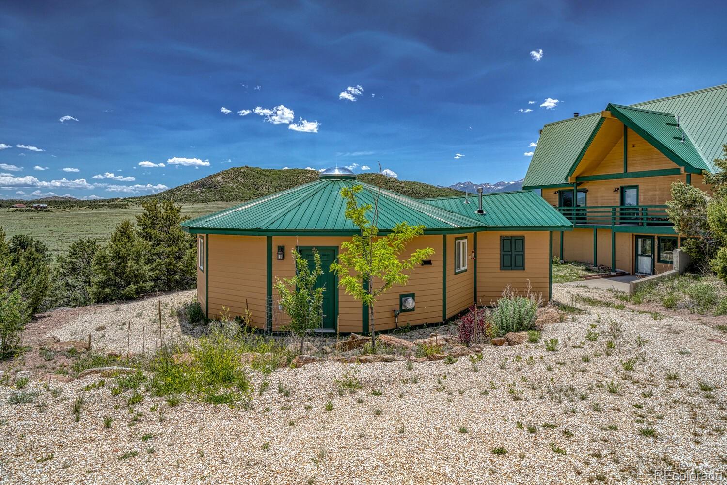 895 Acorn Road Cotopaxi, CO 81223 - Photo 35 of 50 a view of backyard with potted plants and wooden fence