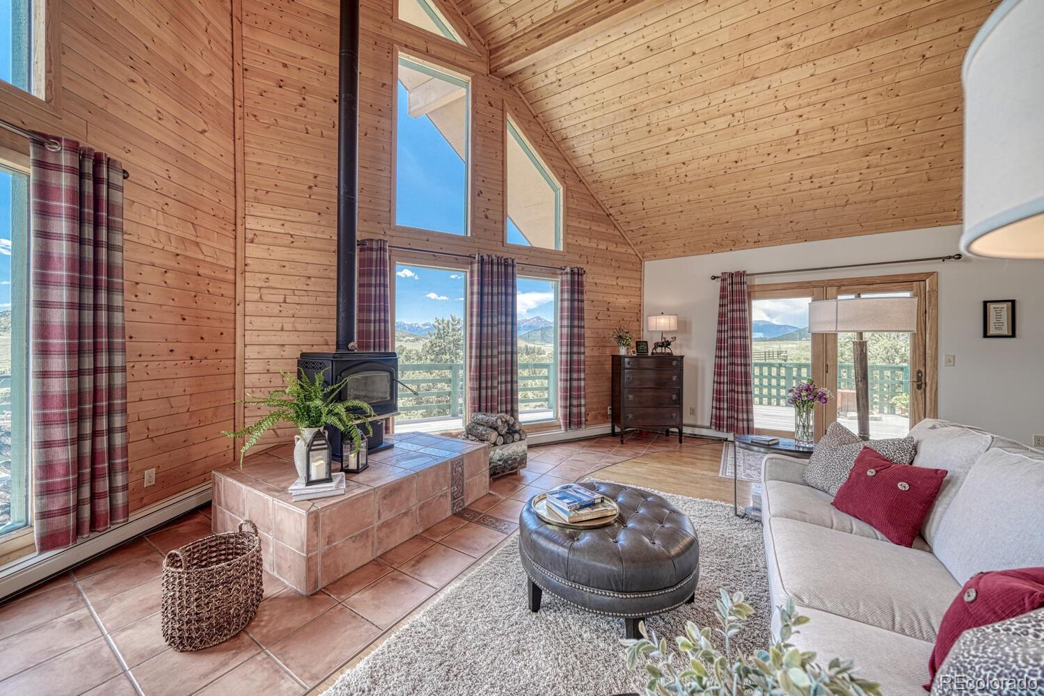 895 Acorn Road Cotopaxi, CO 81223 - Photo 5 of 50 a living room with furniture and a potted plant