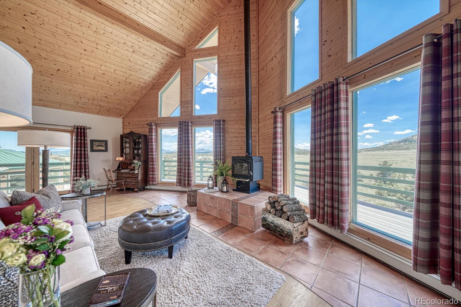 895 Acorn Road Cotopaxi, CO 81223 - Photo 6 of 50 a room with furniture and a large window
