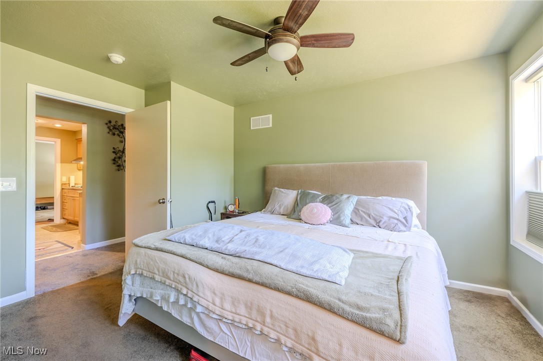 4959 Anderson Road Cleveland, OH 44124 - Photo 34 of 43 Bedroom with carpet floors and a ceiling fan