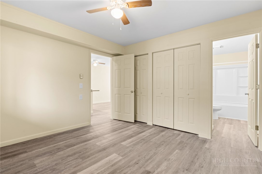 128 Zeb Street, Unit A104 Boone, NC 28607 - Photo 15 of 35 a view of an empty room with wooden floor
