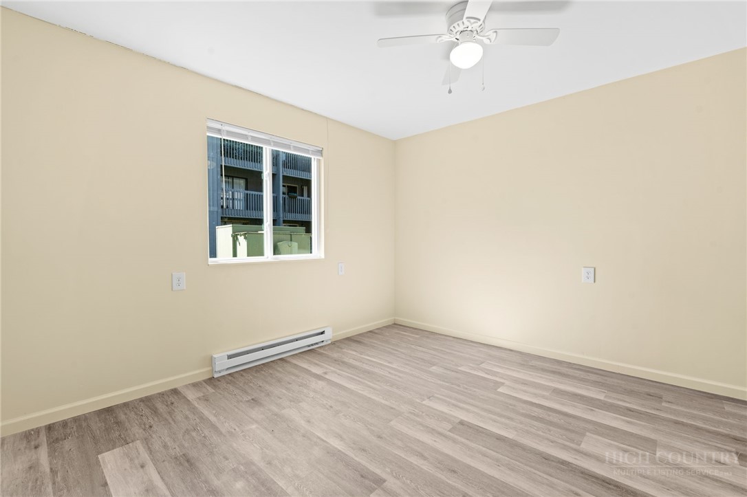 128 Zeb Street, Unit A104 Boone, NC 28607 - Photo 18 of 35 an empty room with a window