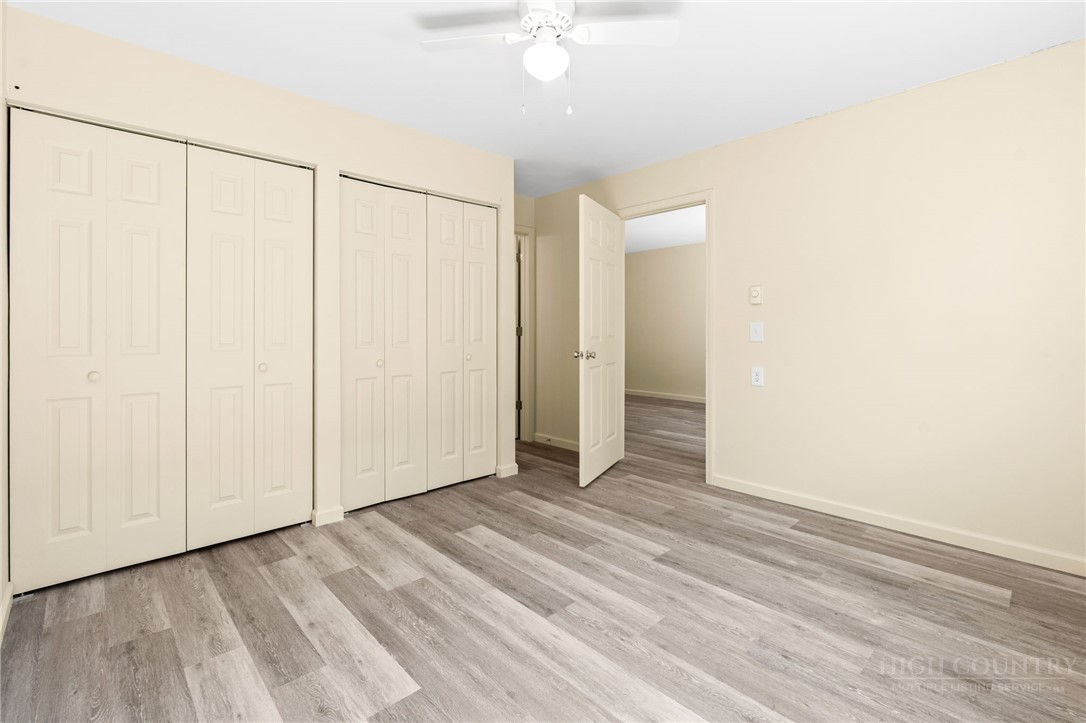 128 Zeb Street, Unit A104 Boone, NC 28607 - Photo 20 of 35 a view of a room with wooden floor