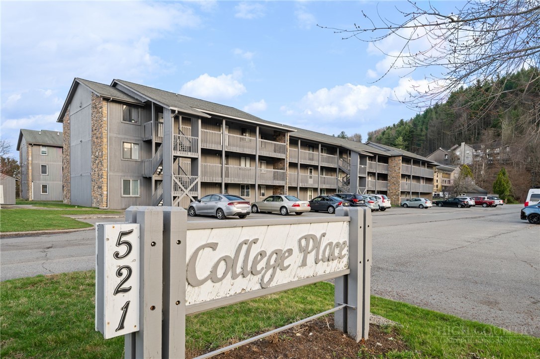 128 Zeb Street, Unit A104 Boone, NC 28607 - Photo 25 of 35 a front view of a building with street sign