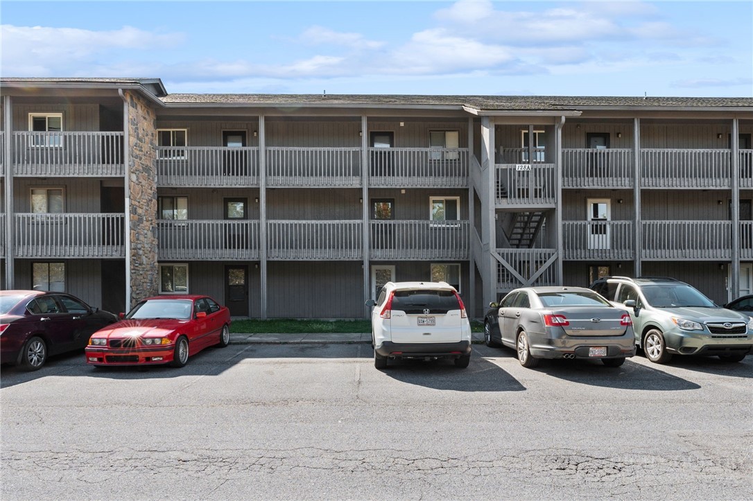 128 Zeb Street, Unit A104 Boone, NC 28607 - Photo 26 of 35 a buildings with car parked in front of it