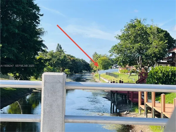a view of a swimming pool with a porch