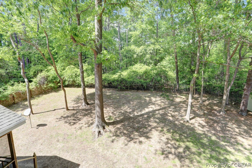 7025 Mumford Cove Road Hayes, VA 23072 - Photo 34 of 43 View of fenced in back yard
