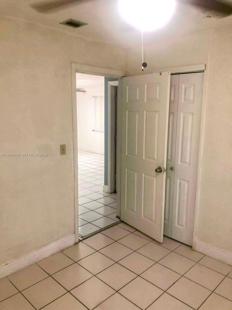 580 Tallulah Road Lake Worth, FL 33462 - Photo 11 of 12 a view of a hallway