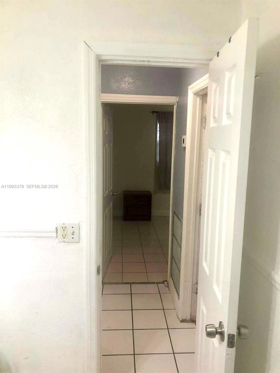 580 Tallulah Road Lake Worth, FL 33462 - Photo 12 of 12 a bathroom with a toilet