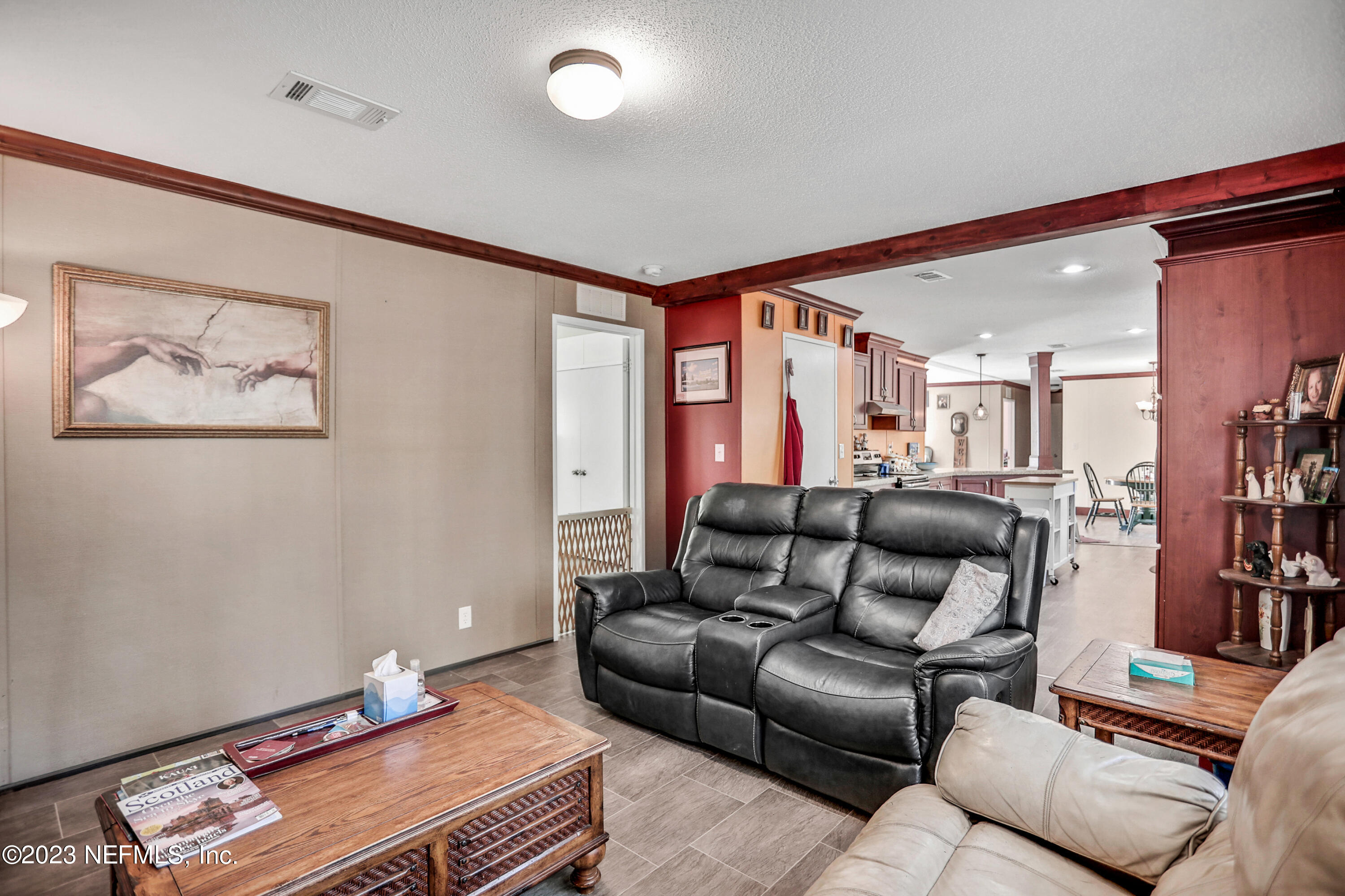 13305 Yellow Bluff Road Jacksonville, FL 32226 - Photo 8 of 39 a living room with furniture and a couch