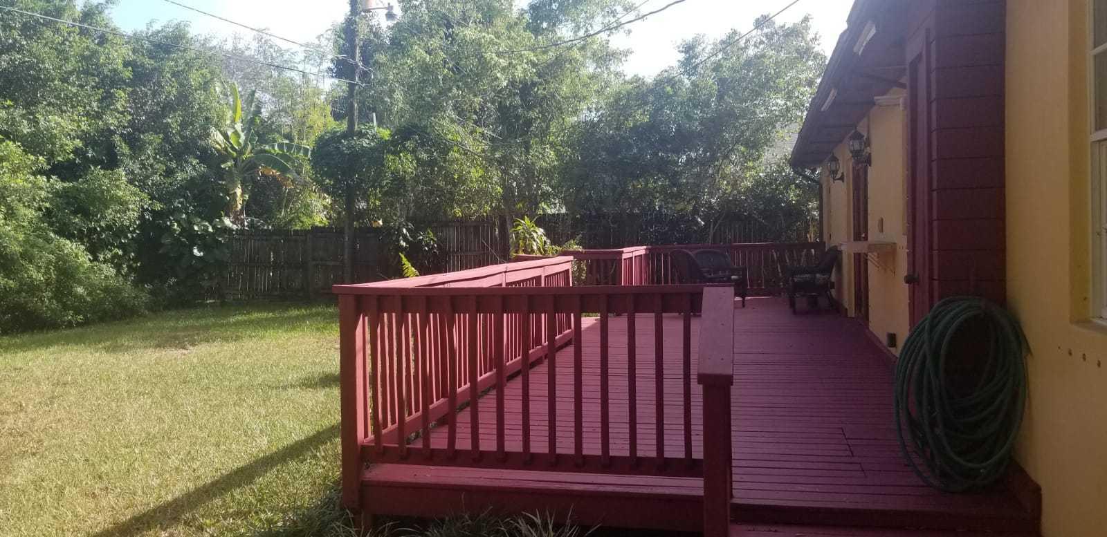 14930 Whatley Road Delray Beach, FL 33445 - Photo 24 of 26 a view of a backyard with a deck
