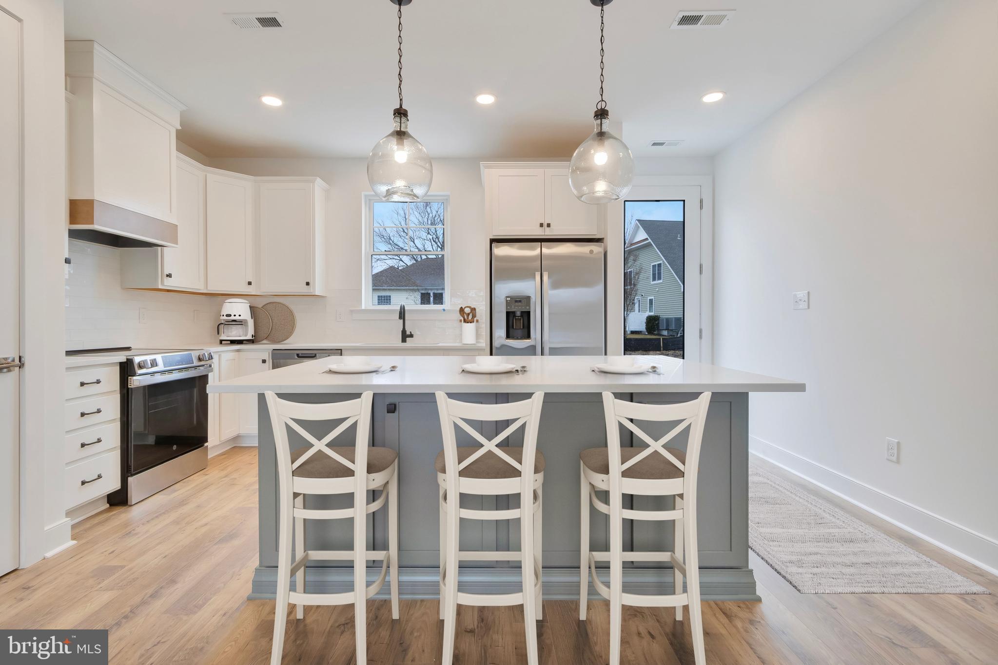 223 Chad Place Ocean View, DE 19970 - Photo 4 of 58 Kitchen island (virtually staged)