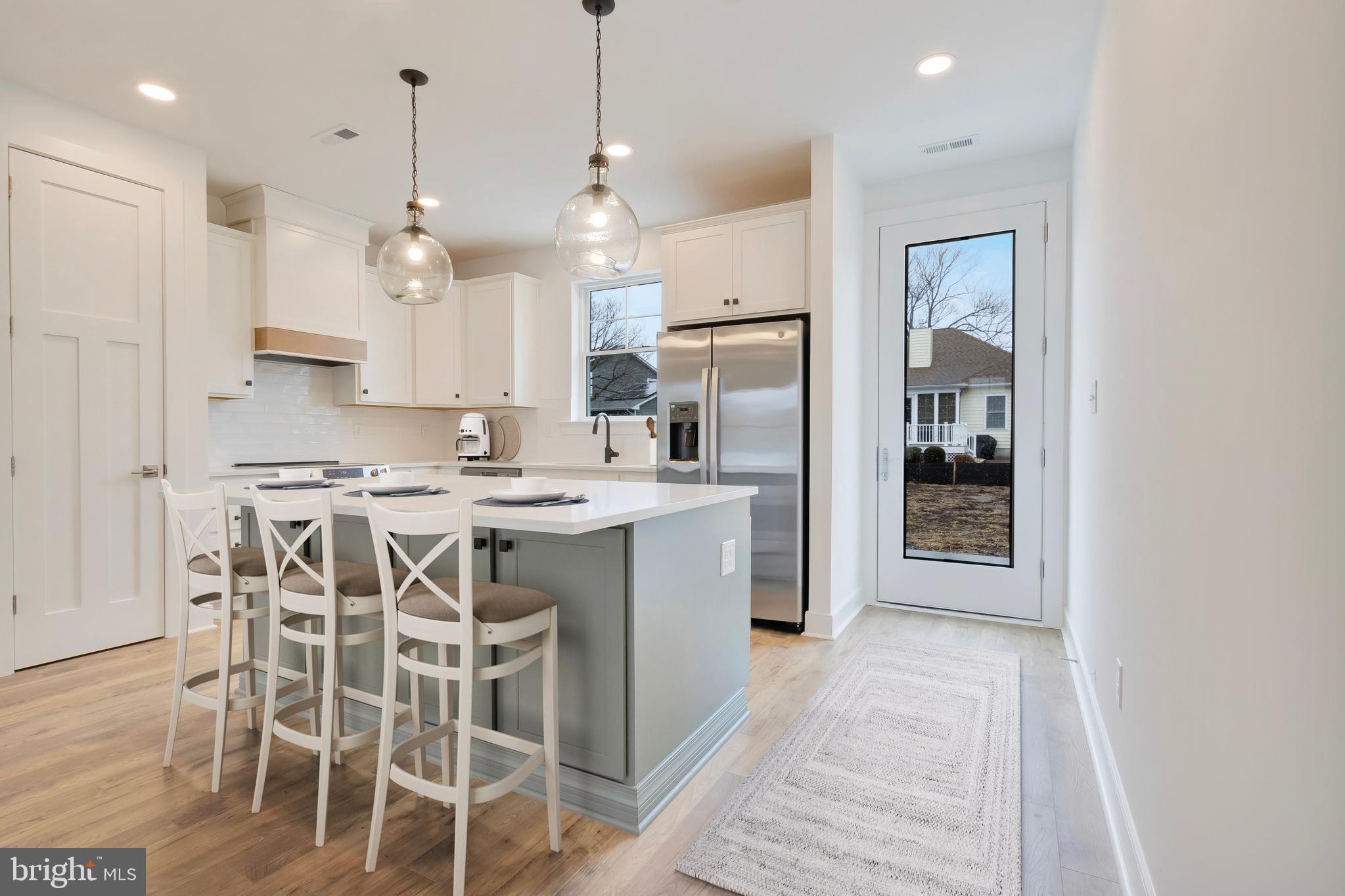 223 Chad Place Ocean View, DE 19970 - Photo 5 of 58 Light filled kitchen (virtually staged)