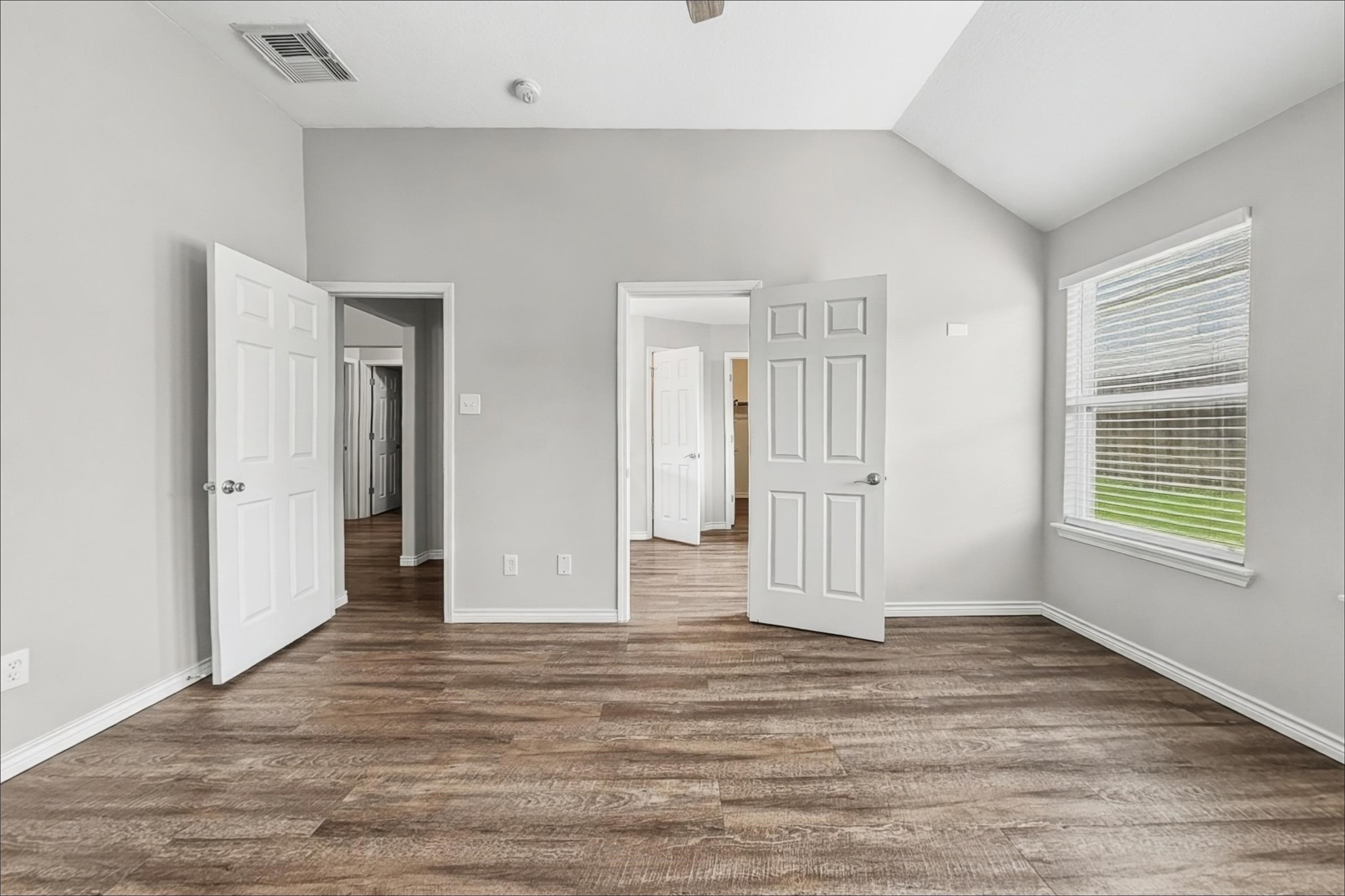 2423 Lofty Falls Court Spring, TX 77386 - Photo 10 of 15 a view of empty room with wooden floor and fan