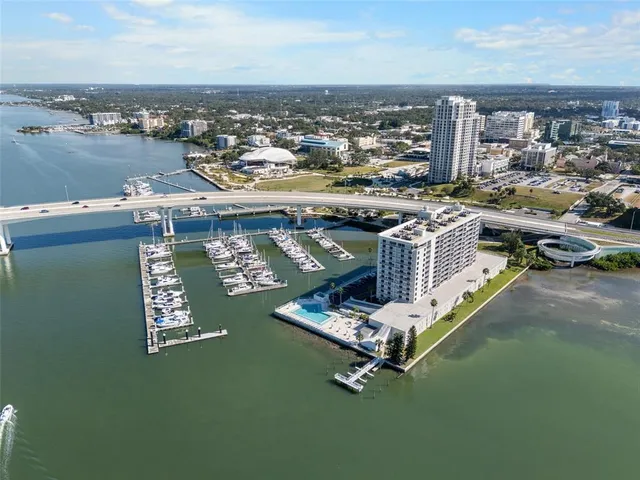 a view of a lake with a table and a chair