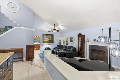 a view of a livingroom with furniture and a fireplace