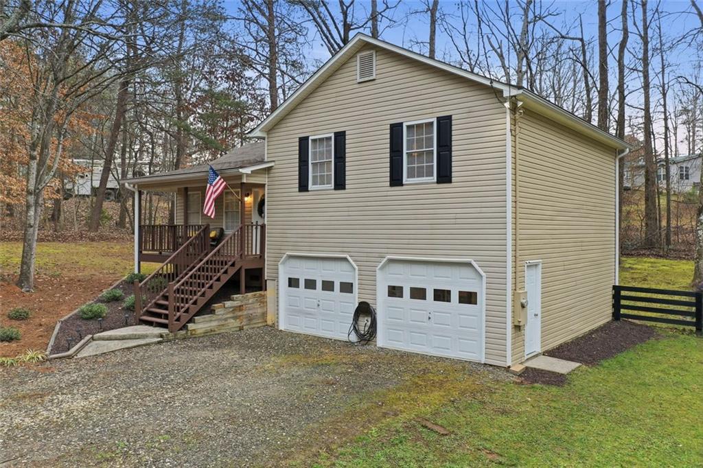 2525 Henderson Mountain Road Jasper, GA 30143 - Photo 2 of 23 a view of a house with a yard