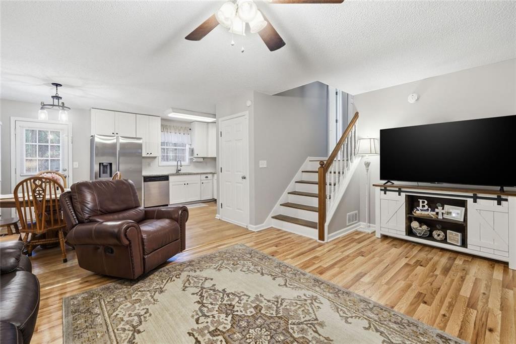 2525 Henderson Mountain Road Jasper, GA 30143 - Photo 3 of 23 a living room with furniture and a flat screen tv