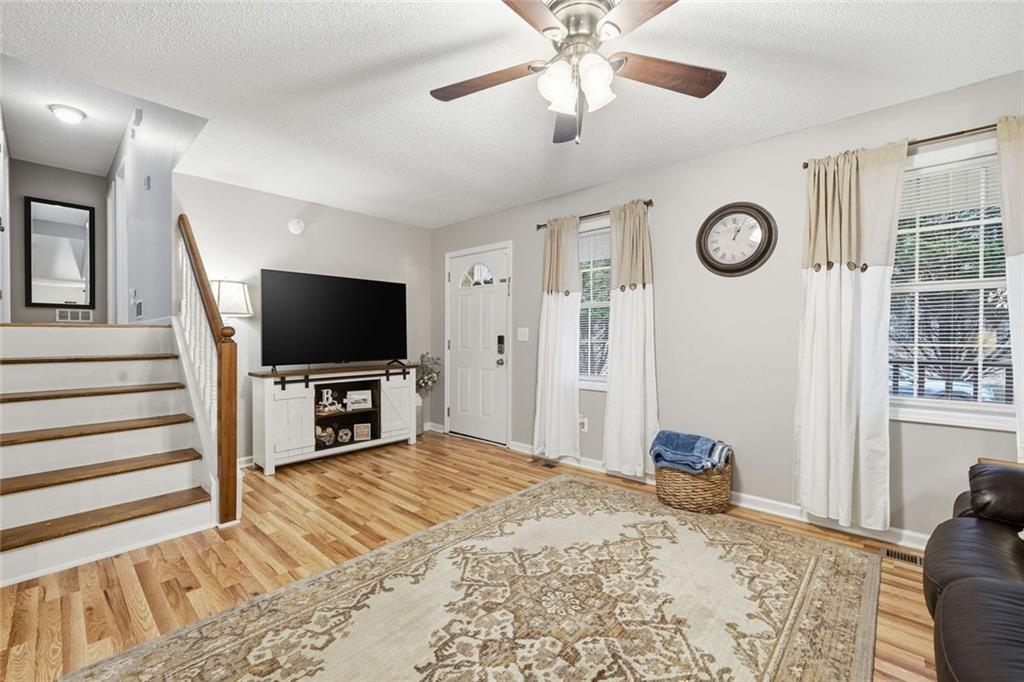 2525 Henderson Mountain Road Jasper, GA 30143 - Photo 5 of 23 a bedroom with a bed and a flat screen tv