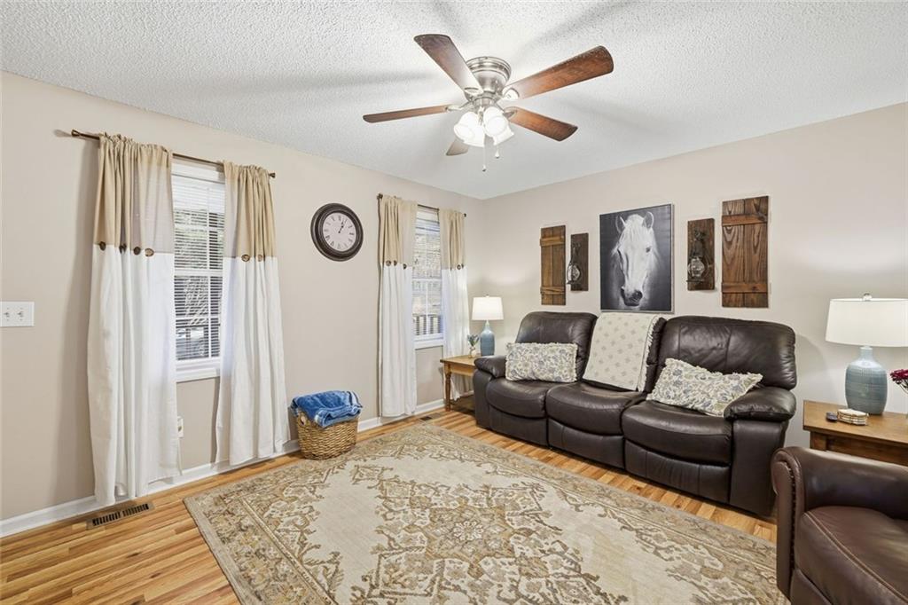 2525 Henderson Mountain Road Jasper, GA 30143 - Photo 6 of 23 a living room with furniture and a window