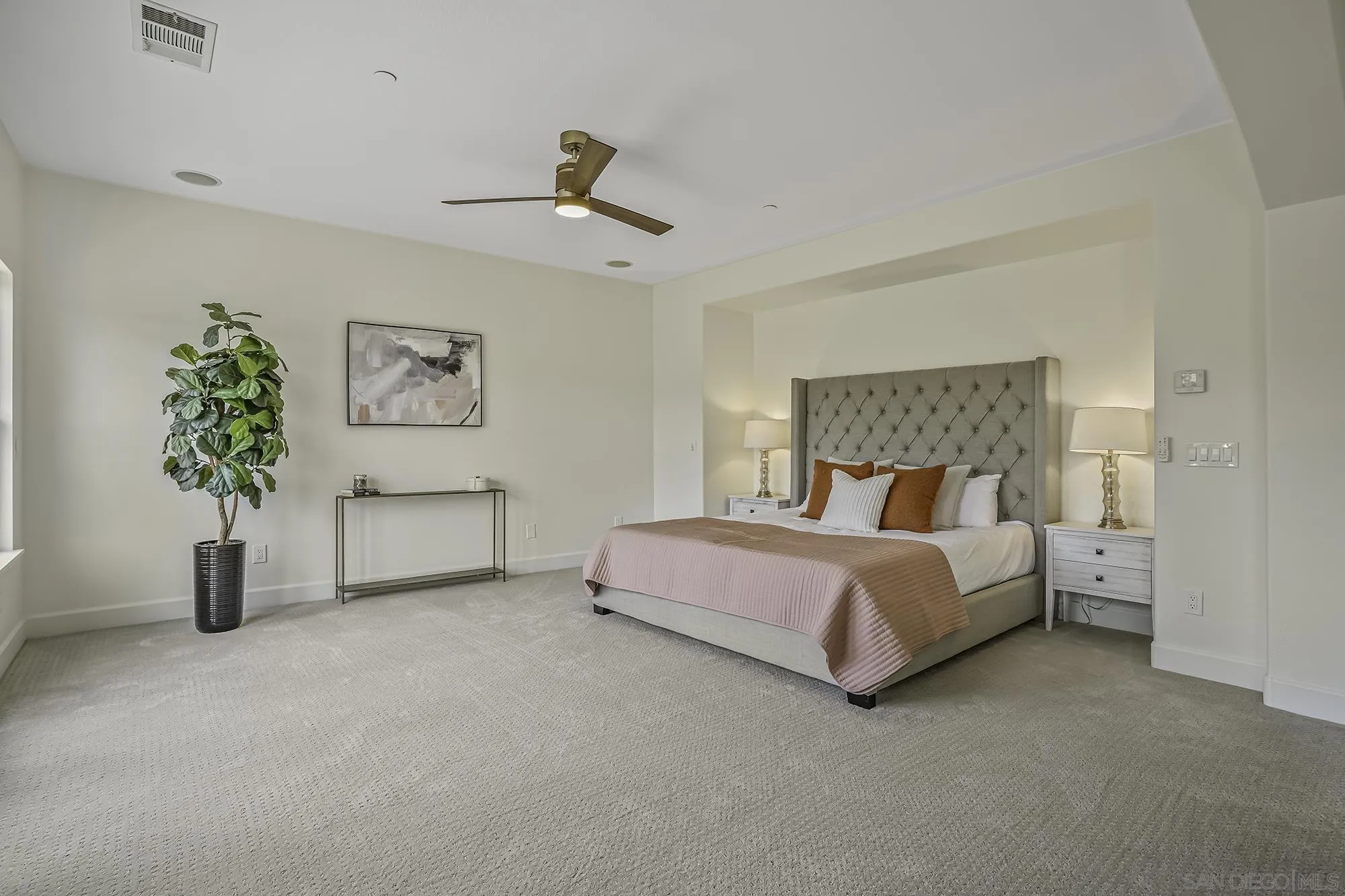 3737 Keri Way Fallbrook, CA 92028 - Photo 15 of 43 a bedroom with a bed and a potted plant