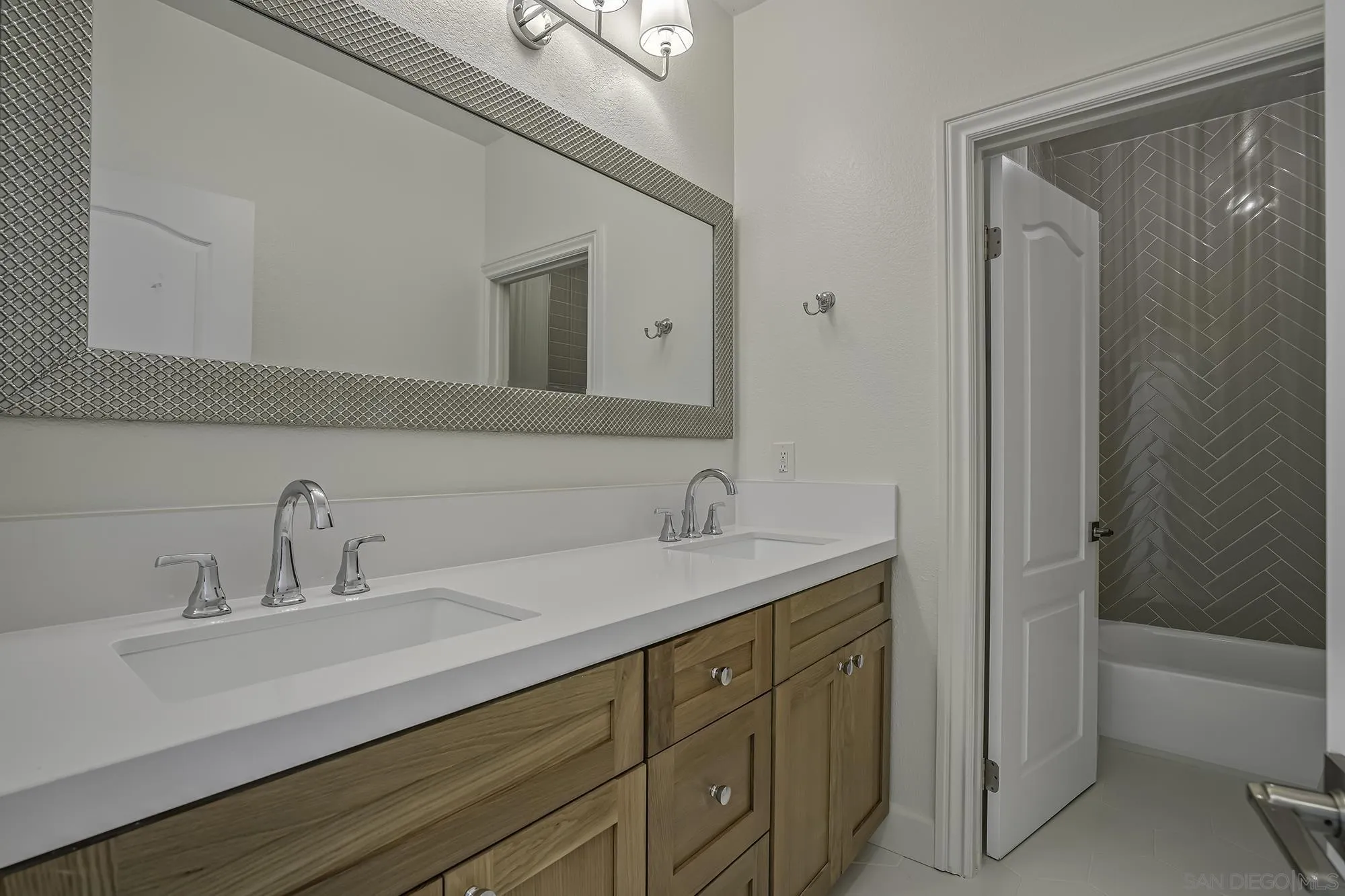 3737 Keri Way Fallbrook, CA 92028 - Photo 27 of 43 a bathroom with a sink double vanity granite tub and shower