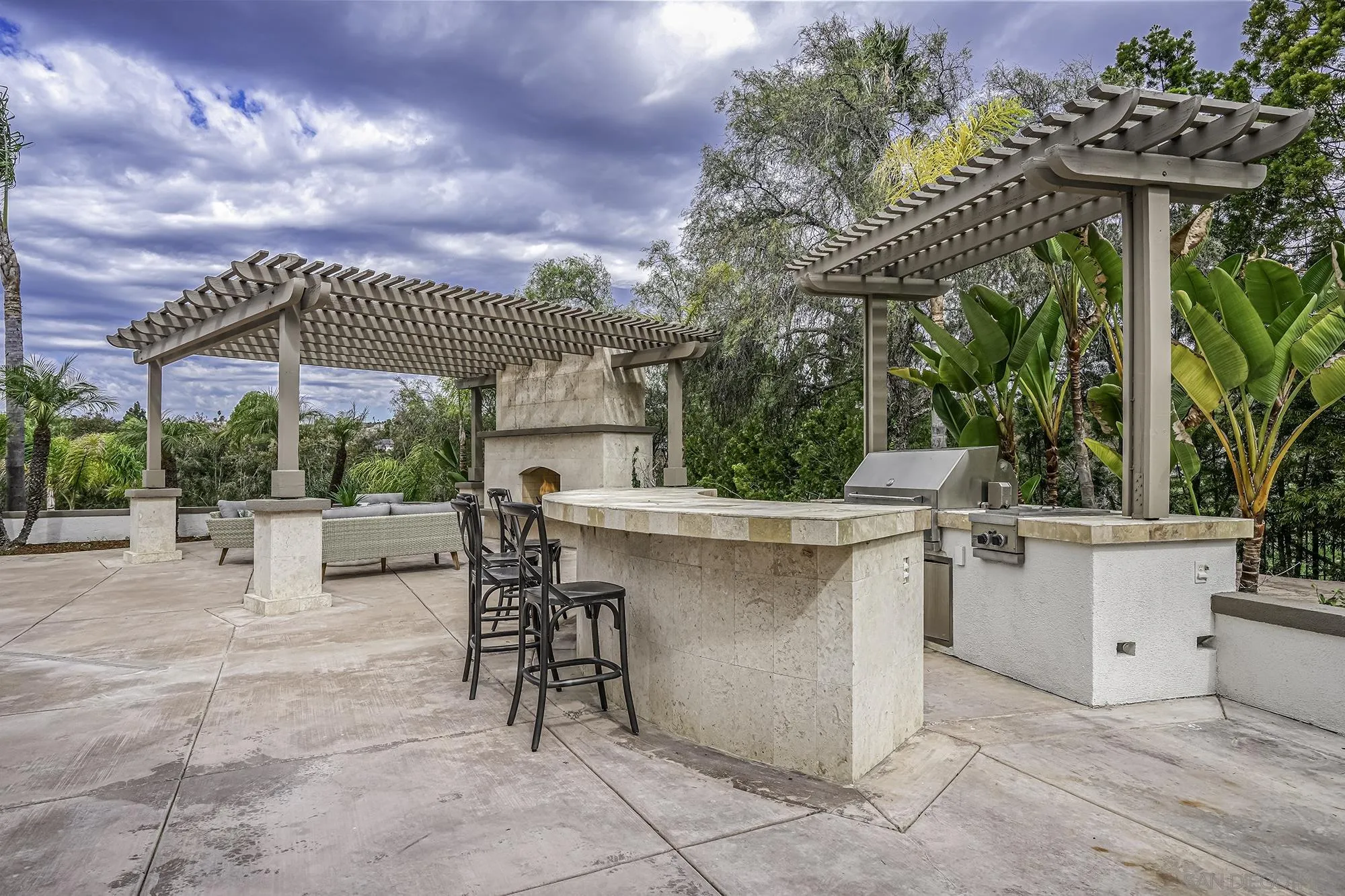 3737 Keri Way Fallbrook, CA 92028 - Photo 29 of 43 a view of a patio with a table and chairs