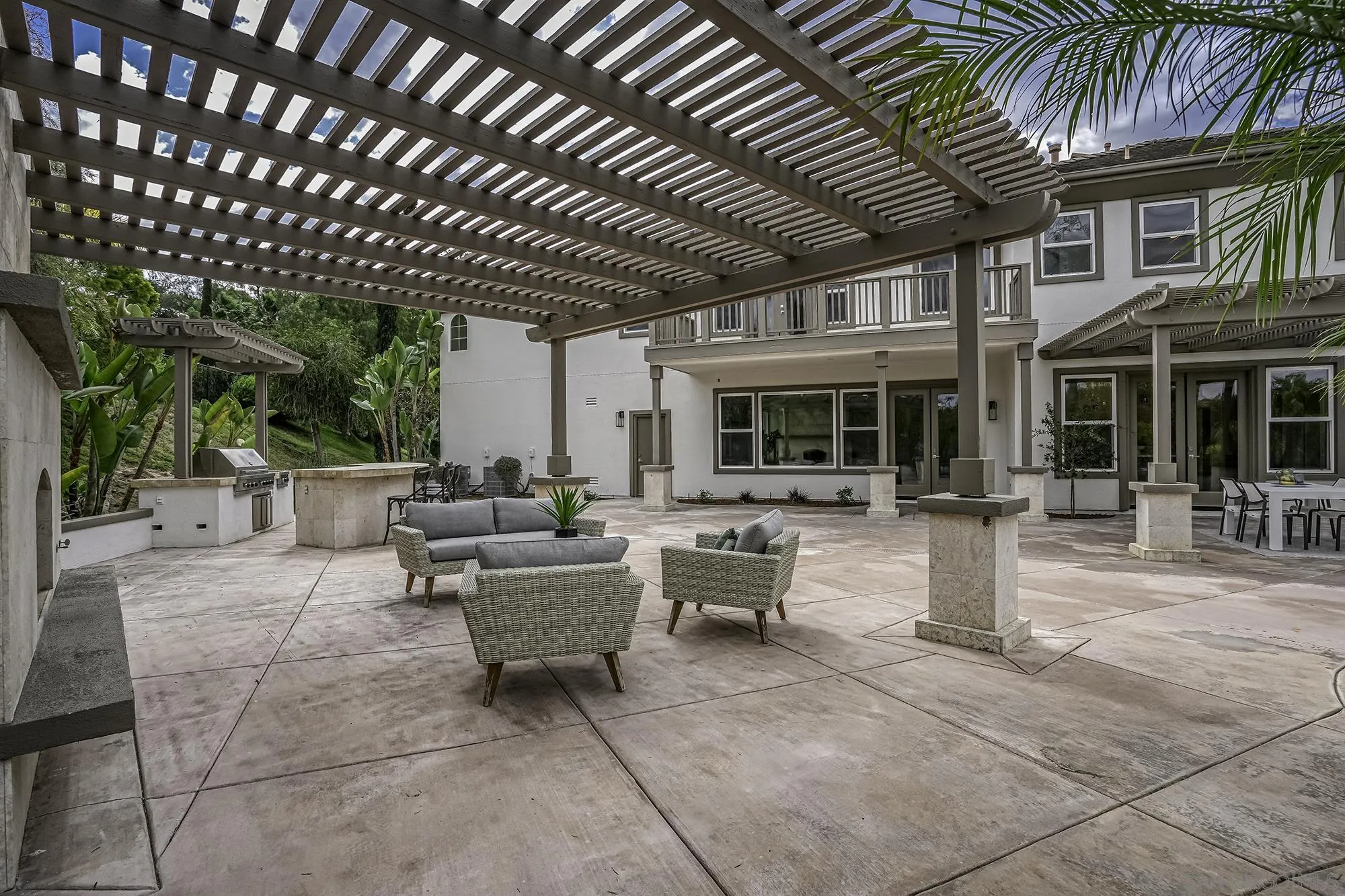3737 Keri Way Fallbrook, CA 92028 - Photo 31 of 43 a view of a patio with couches and potted plants