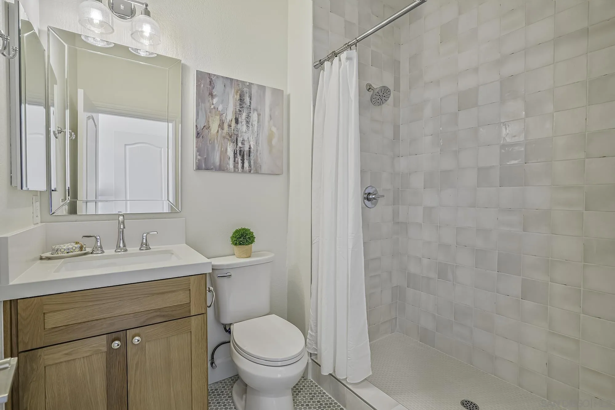 3737 Keri Way Fallbrook, CA 92028 - Photo 10 of 43 a bathroom with a sink toilet and shower