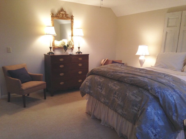 1872 Wood Valley Road Macon, GA 31211 - Photo 17 of 28 a bedroom with a bed and a lamp on dresser