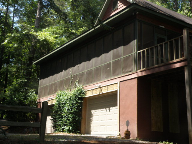 1872 Wood Valley Road Macon, GA 31211 - Photo 21 of 28 a front view of a house with a tree