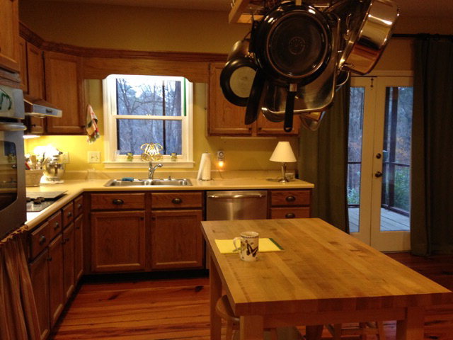 1872 Wood Valley Road Macon, GA 31211 - Photo 7 of 28 a kitchen with kitchen island a stove and a sink