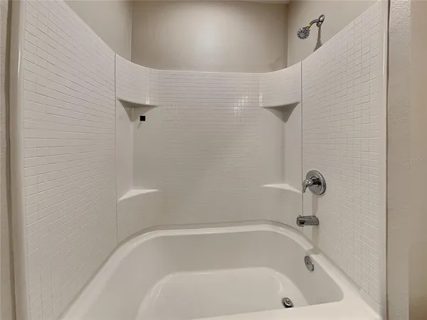 a bathroom with a tub