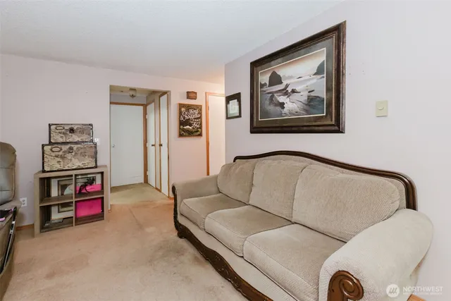 a living room with furniture and a couch