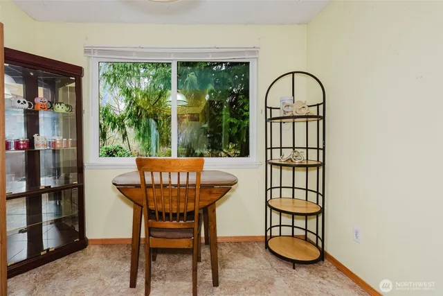 a view of a livingroom with furniture