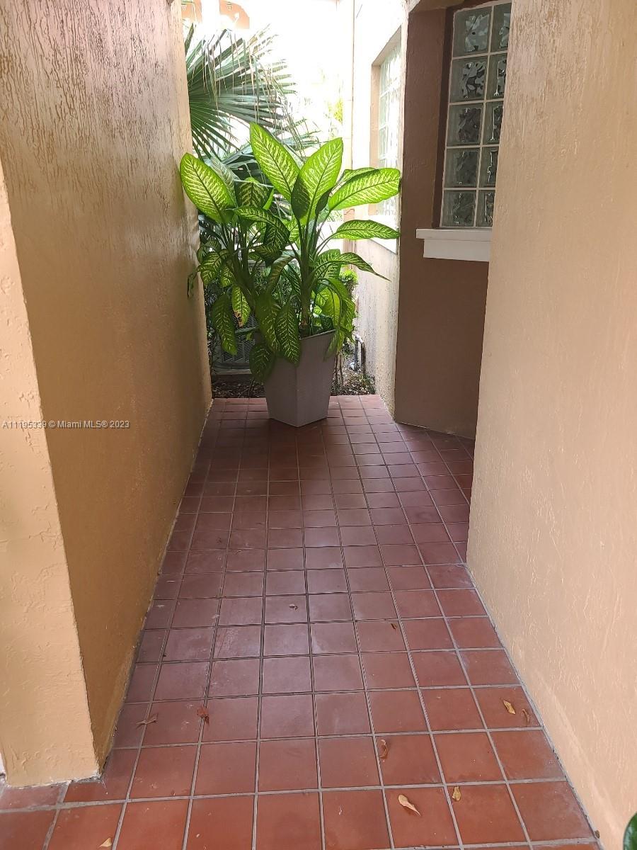 10030 Hammocks Boulevard, Unit 101 Miami, FL 33196 - Photo 2 of 27 a view of a entryway